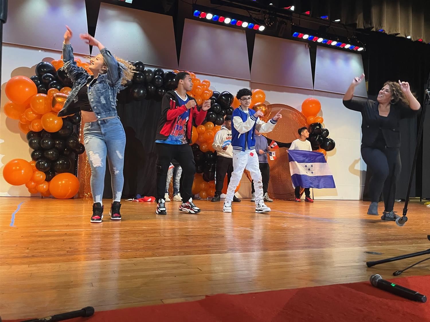 Dancers on stage including several students and one staff member