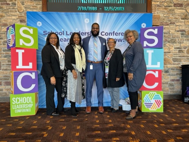  photo of school board members at the conference